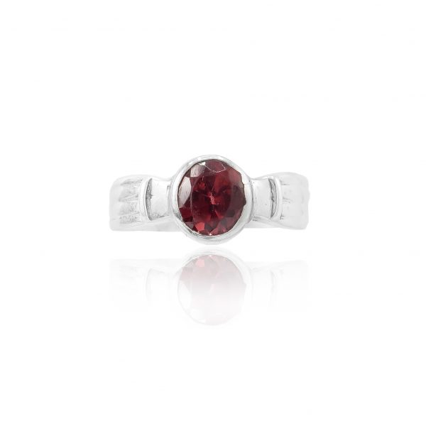 The signet design adds a touch of vintage charm, making it a versatile piece that seamlessly transitions from casual to formal occasions. The bold presence of the rhodolite gemstone makes a statement of both elegance and individuality.